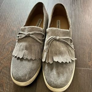 Grey Suede Steve Madden slip-ons.